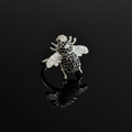 Cosmic bee ring