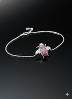 WRAPGAME INDIA silver chain bracelet with a pink and white CZ-encrusted bee motif.