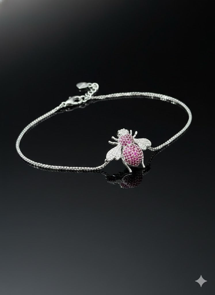 WRAPGAME INDIA silver chain bracelet with a pink and white CZ-encrusted bee motif.