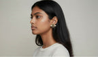 WRAPGAME INDIA gold polish bee stud earrings with blue CZ-AAA stones and anti-tarnish finish.