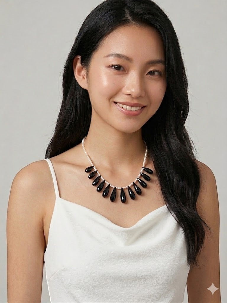 WRAPGAME INDIA necklace with black onyx teardrop pendants and pearls, bulb drop design.